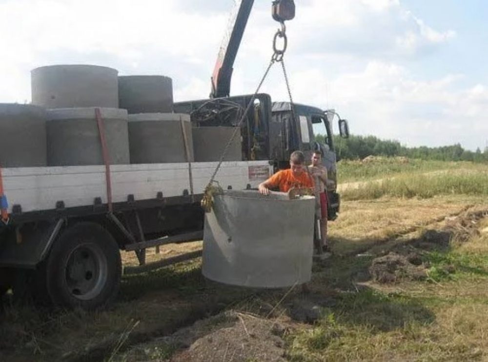 Перевозка бетонных колец и колодцев манипулятором стоимость услуг и где заказать - Кострома